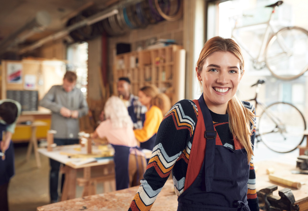 Young female entrepreneur in bike shop.